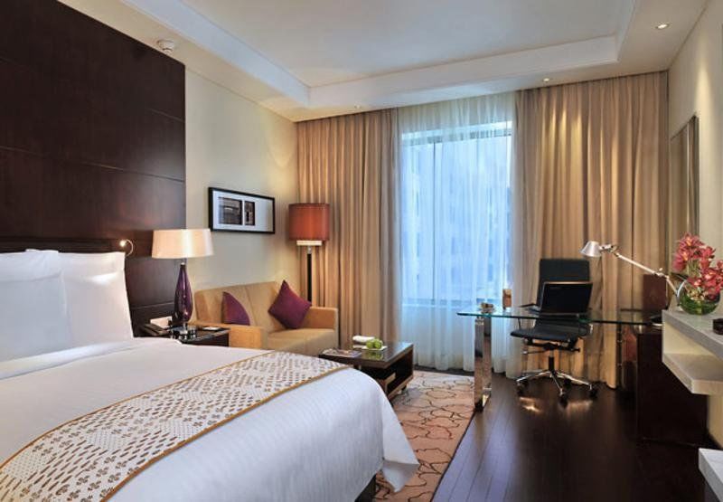 Jaipur Marriott Hotel Екстериор снимка A room at the Taj Bengal